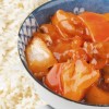 Pork with apricot sauce and rice